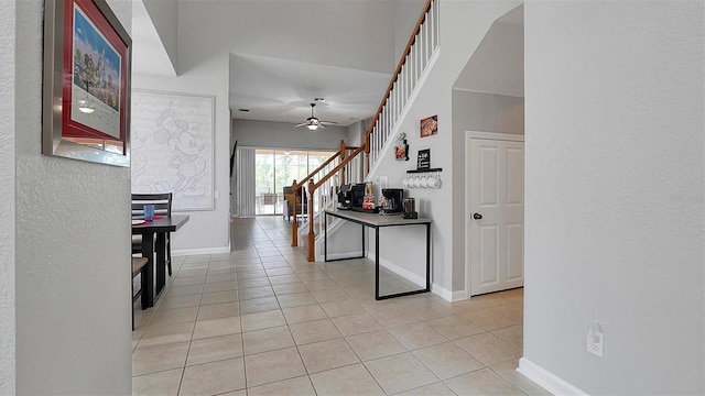 kitchen with ceiling fan and light tile patterned flooring