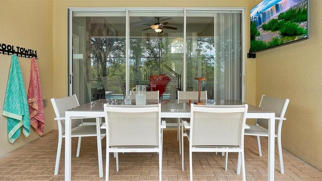 dining area with ceiling fan