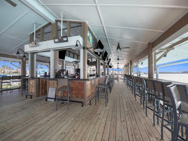 wooden terrace with outdoor dry bar