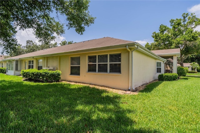 exterior space with a front yard