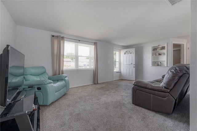 living room featuring carpet floors