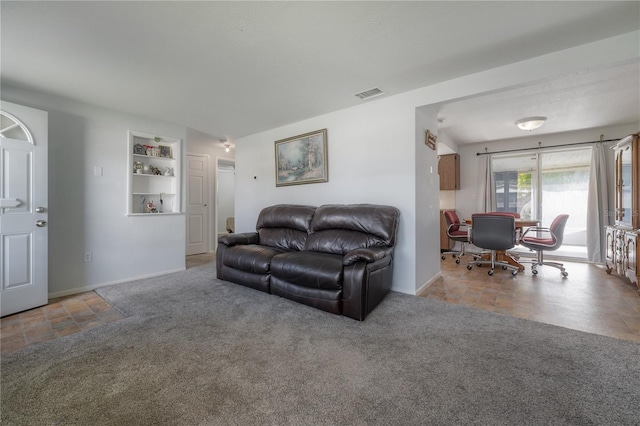 living room featuring built in features and carpet flooring