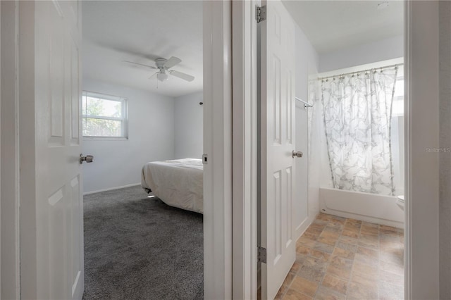 carpeted bedroom featuring ceiling fan