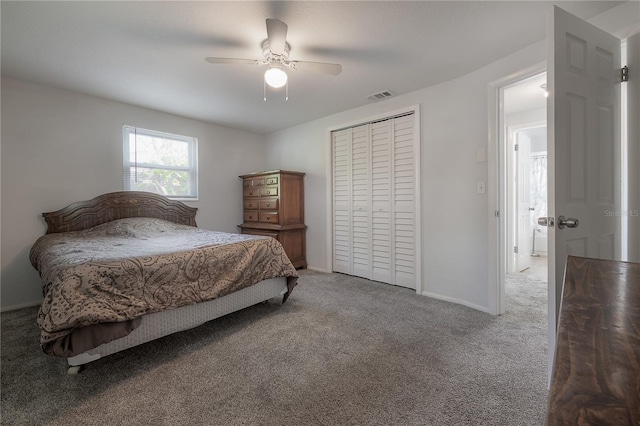 bedroom with carpet floors, ceiling fan, and a closet