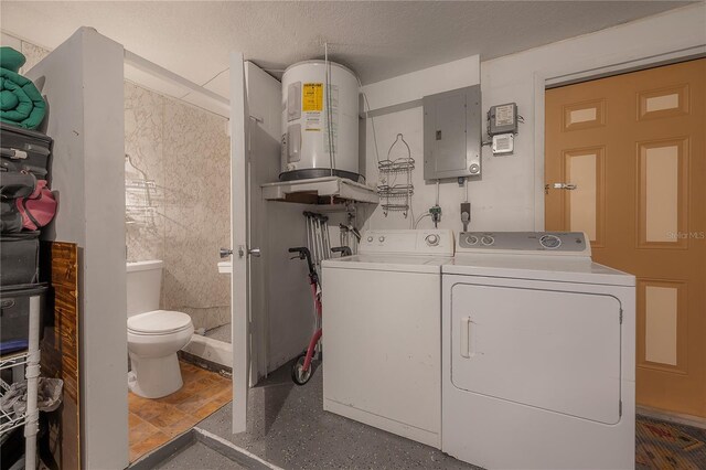 laundry room featuring electric water heater, electric panel, independent washer and dryer, and a textured ceiling