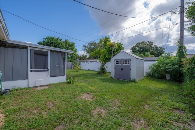 view of yard featuring a shed