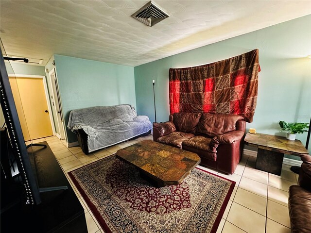 living room featuring light tile patterned floors