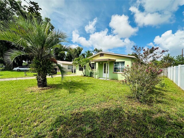 view of front of home with a front lawn