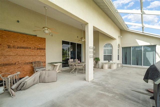 view of patio featuring ceiling fan