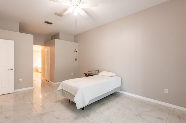 bedroom with connected bathroom and ceiling fan