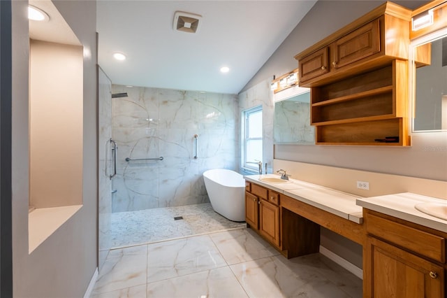 bathroom featuring vanity, lofted ceiling, and independent shower and bath