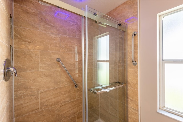 bathroom with walk in shower