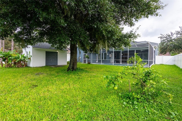 view of yard featuring glass enclosure