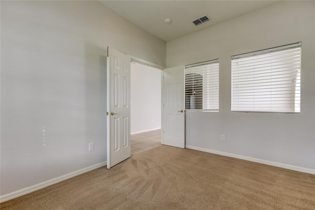 view of carpeted spare room