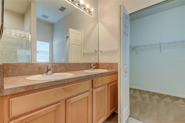 bathroom featuring double vanity