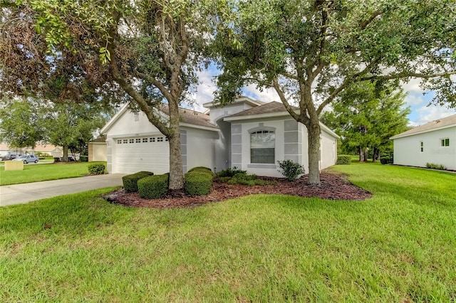 ranch-style house featuring a front yard and a garage