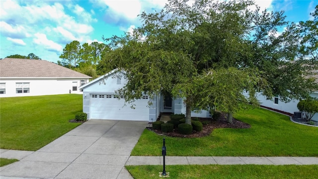 view of front facade featuring a front yard and a garage