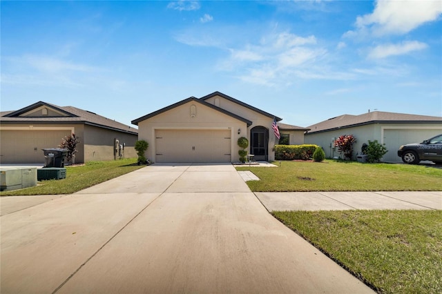 ranch-style house with a garage and a front lawn