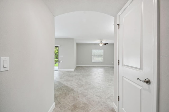 corridor with light tile patterned floors