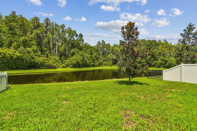 view of yard with a water view