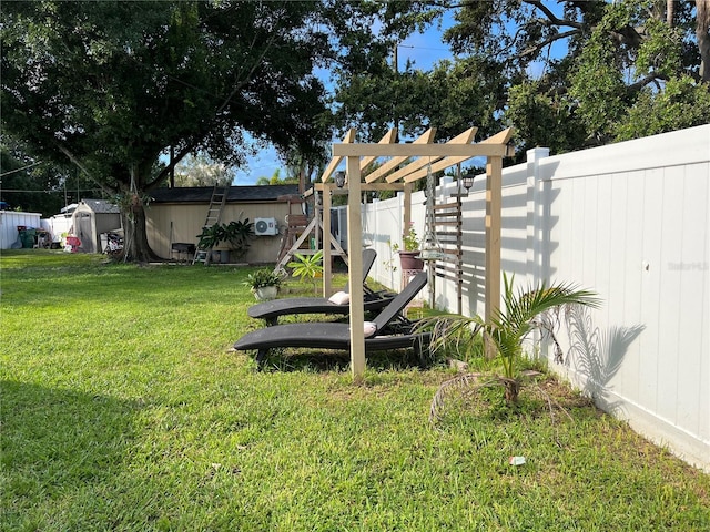 view of yard with a playground and a storage unit