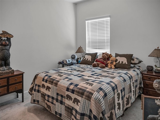 bedroom featuring carpet