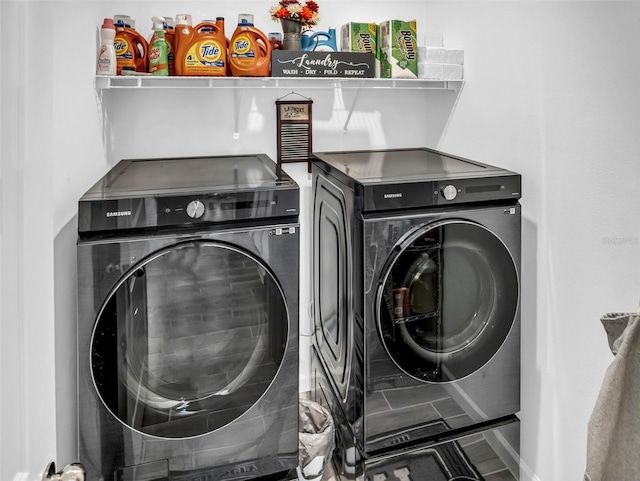 laundry room featuring separate washer and dryer