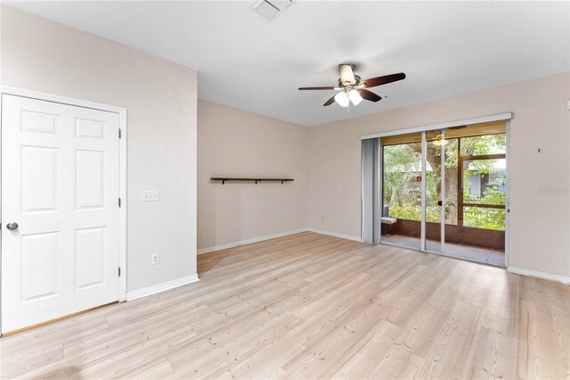 unfurnished room with ceiling fan and light hardwood / wood-style floors