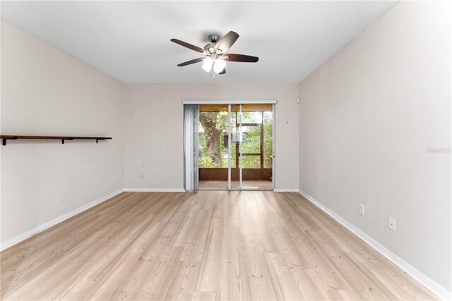 spare room featuring ceiling fan and light hardwood / wood-style flooring