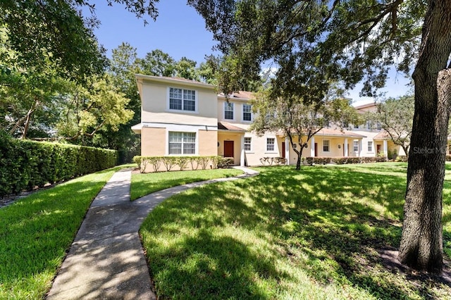 view of front facade featuring a front yard