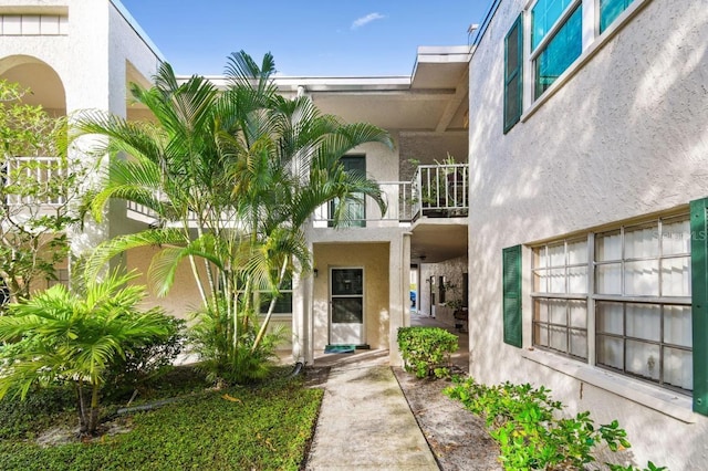 doorway to property featuring a balcony