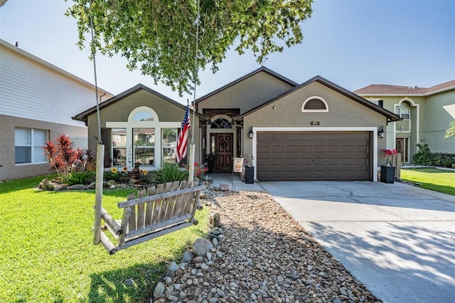 ranch-style home with a garage and a front yard