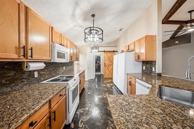 kitchen featuring white appliances, a barn door, tasteful backsplash, lofted ceiling, and a sink