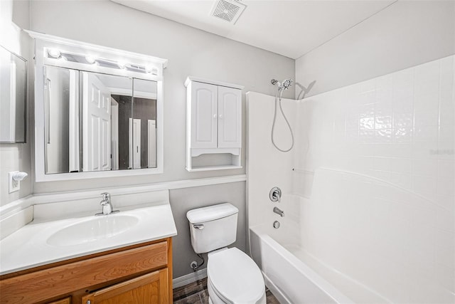 full bathroom with toilet, bathing tub / shower combination, visible vents, and vanity