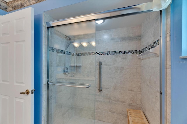 bathroom featuring an enclosed shower