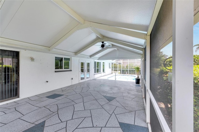 view of patio / terrace featuring ceiling fan and french doors