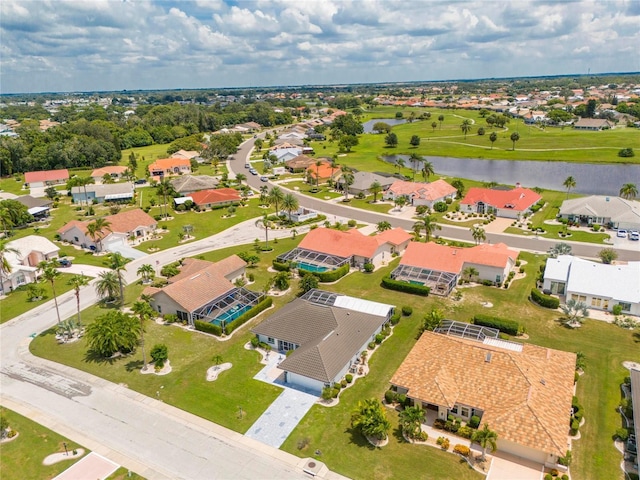 bird's eye view with a water view