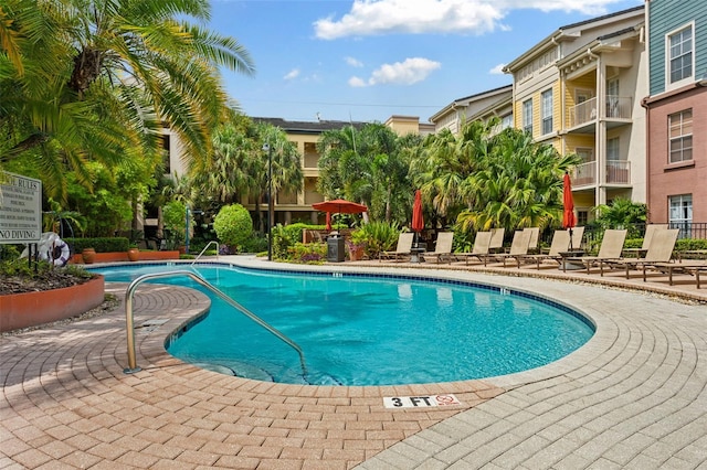 pool with a patio