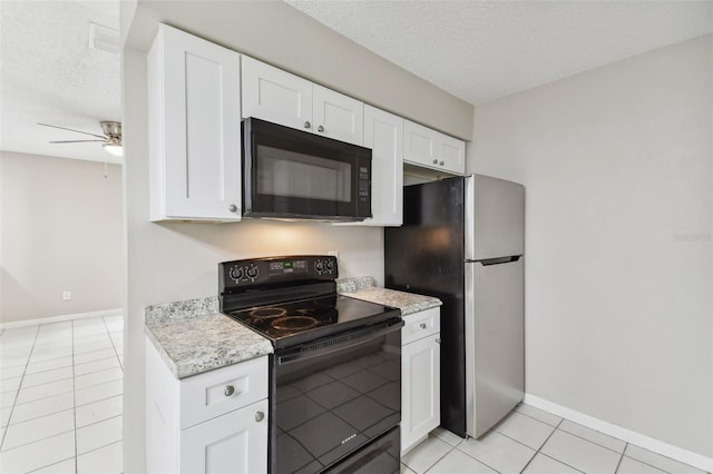 kitchen with black appliances, white cabinetry, a textured ceiling, and light tile patterned floors