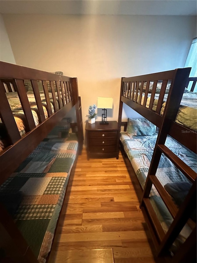 bedroom featuring wood-type flooring