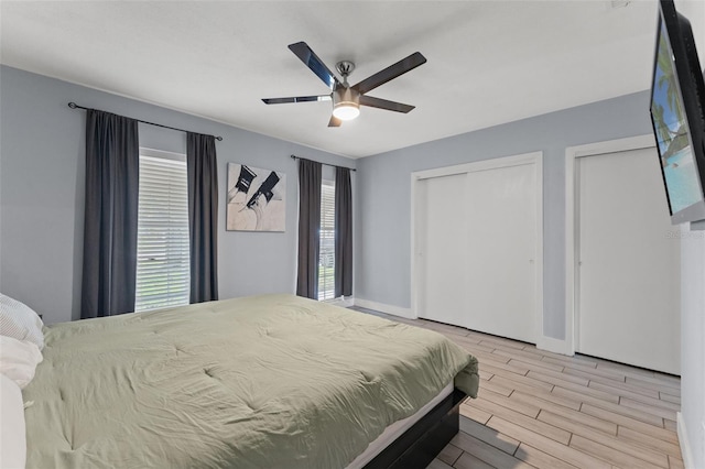 bedroom featuring light hardwood / wood-style floors and ceiling fan