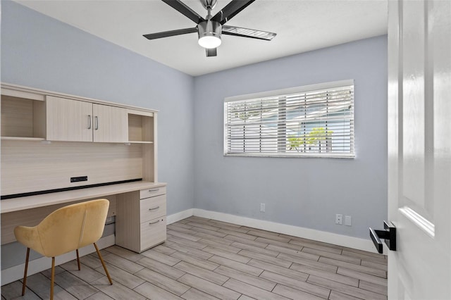 office area featuring light hardwood / wood-style floors and ceiling fan