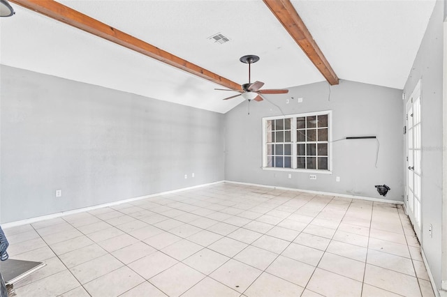 tiled spare room featuring ceiling fan and lofted ceiling with beams