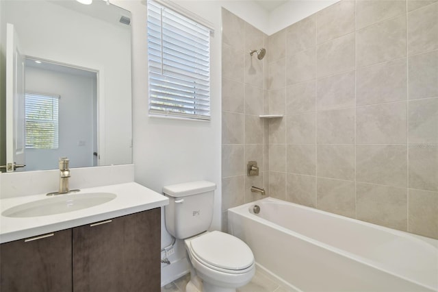 full bathroom with toilet, shower / tub combination, visible vents, and vanity