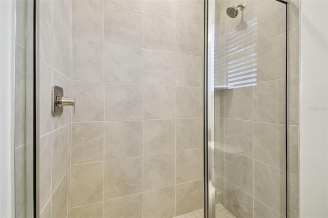 bathroom featuring a stall shower