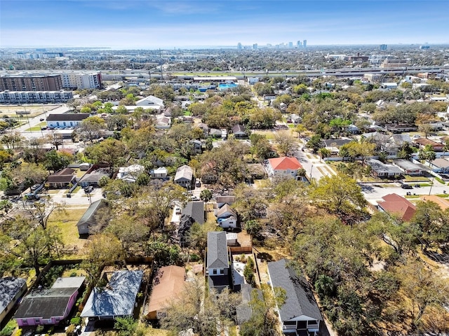 birds eye view of property featuring a city view