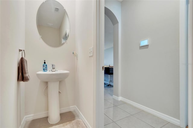 bathroom with tile patterned flooring