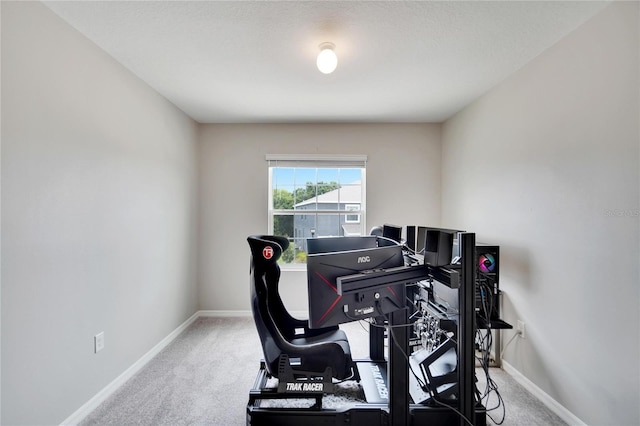 exercise room featuring carpet