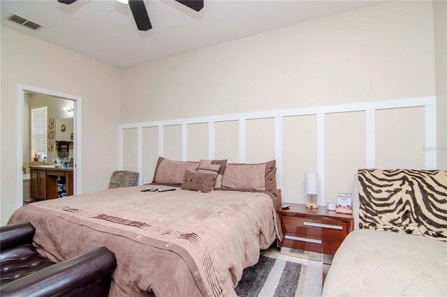 bedroom featuring ceiling fan and tile patterned flooring