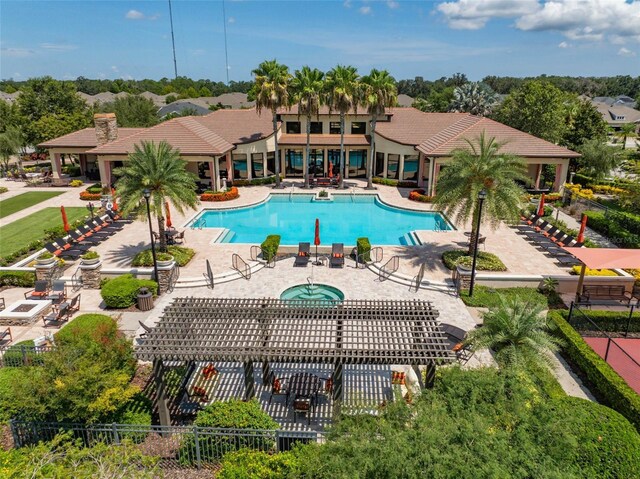 view of swimming pool featuring a pergola and a patio